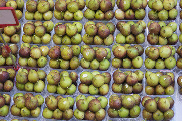 Boxes of fresh commons figs, presented for sale, top view.