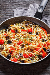 spaghetti alla caponata in a pan, top view