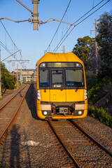 Fototapeta premium Commuter Train fast moving through a Station in Sydney NSW Australia