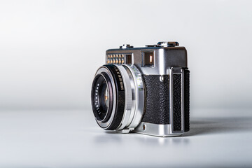 Vintage SLR camera isolated on white background