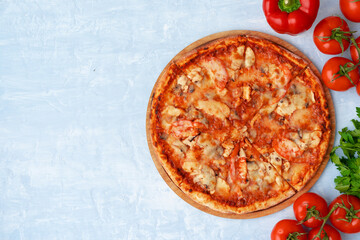 Tasty pizza with chicken and mushrooms, top view