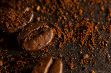 Dark background for a design of several coffee beans and coffee powder