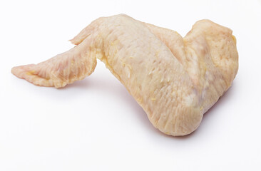 Clean raw chicken wing isolated on white background.