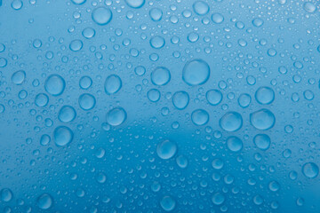 Water drops behinf blue plastic wrap 0311