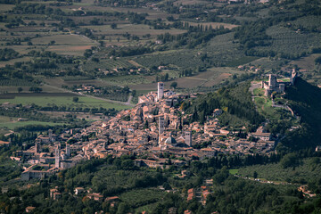 A view on the city of Assisi with a valley in the background
