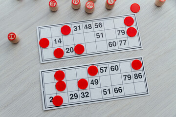 Traditional Russian board game Russian Lotto. Cards with numbers, closeup.