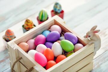 Blank easter eggs on the wooden box ready to paint