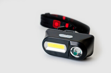 Fototapeta premium LED headlamp with two light sources for tourism, sports and work.