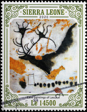 Stag in cave paintings of Lascaux on postage stamp