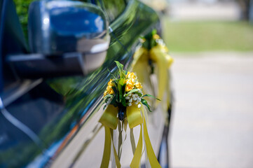 Beautiful flowers and wedding rings on the wedding day.