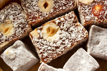 The traditional Turkish dessert Cezerye with hazelnuts. Lokum, Turkish delight.