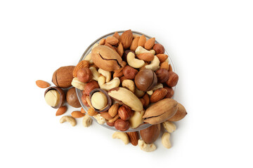 Glass bowl with different nuts isolated on white background