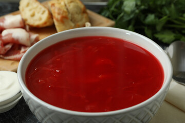 Concept of tasty eating with bowl of tasty borscht