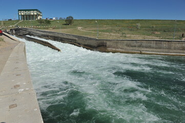 Zhambyl region, Kazakhstan - 05.15.2013 : Dam water discharge compartment at a hydroelectric power station.