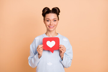 Photo of optimistic brunette lady show like wear sweater isolated on pastel beige color background