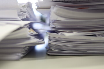 Stack of files, documents, papers in the office.