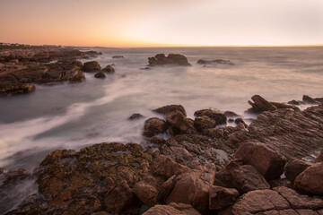 A seascape with slow motion blur on the waves and moving water, Lambert's Bay, Western Cape, South Africa