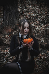 Naklejka premium Witch in the form of a student in the forest