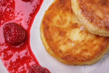 Close-up view of tasty healthy breakfast with cheesecakes