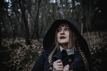 Witch in the form of a student in the forest