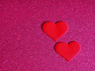 Valentine's Day concept, silver and red heart on pink background, greeting card