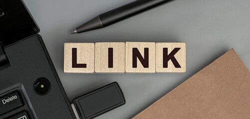 link - word concept from wooden blocks. Top view