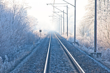 Fototapeta premium Railroad track in frost landscape view
