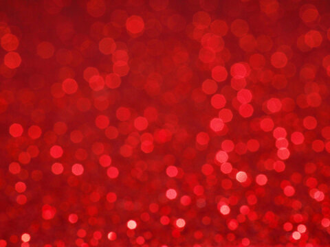 Banner Defocused abstract pink red twinkle light background. Pink red glittery bright shimmering background use as a design backdrop.