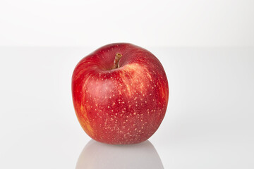 Fresh juicy red apple fruit isolated on the white background.