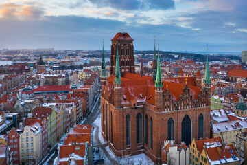 Fototapeta na wymiar Beautiful old town of Gdansk with Saint Mary Basilica at sunset, Poland