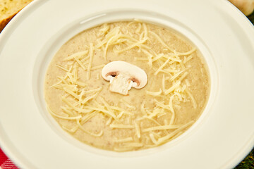 Mushroom soup puree with cream, champignons and vegetables. Vegan and diet healthy food