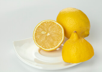 Sliced lemon on a white plate