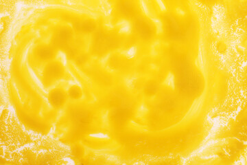 yellow liquid aquarelle paint background