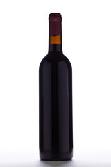 Red wine bottle isolated over white background