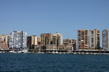 Fototapeta na wymiar Yachts at the pier in the sea port of Malaga