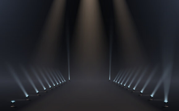 Dark hall with lamps and light rays