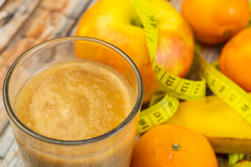 Fresh detox smoothie with fruits close up. Selective focus