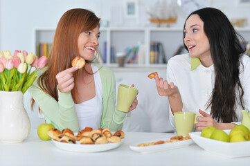 two female friends drinking tea