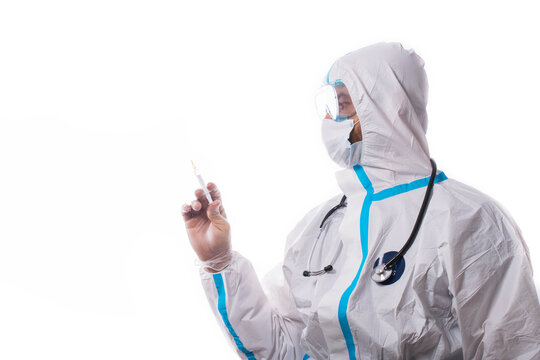 Man In Protective Suit, Medical Mask, Goggles With Arms Crossed. Isolated In Studio