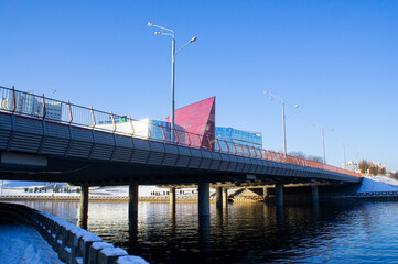 Bridge over the river in the winter city