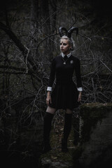 Witch in the form of a student in the forest