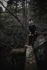 Witch in the form of a student in the forest