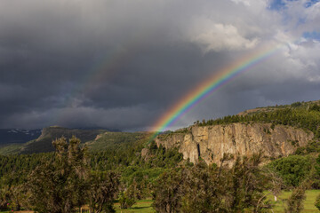 Rainbow view over the Andes mountain in Los Alerces National Park, Patagonia, Argentina	