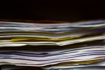 Stack of old papers, books, data sheets.