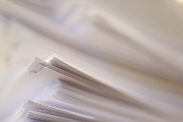 Stack of papers in the office. Close up. Documents. Files.
