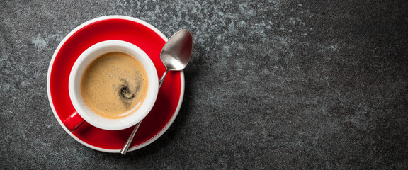 Cup of coffee on black background