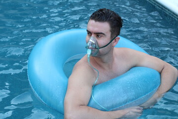 Tourist in the water wearing oxygen mask