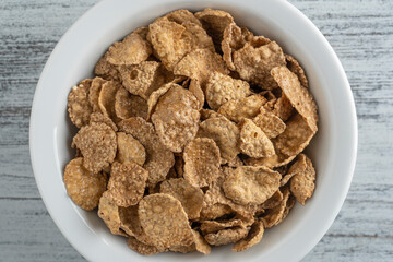 Whole grain glazed flakes in plate. Healthy breakfast, whole grain muesli in a bowl