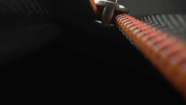A view inside the luggage bag under the zipper while it is closing
