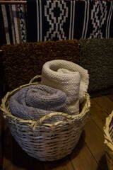 Obraz premium basket and blankets on a table